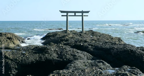 View of shrine on rocky coastline, Oarai, Ibaraki Prefecture, Japan photo