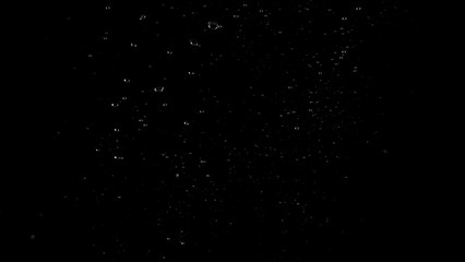 Water bubbles floating after splash underwater and black background which represent freshness of carbonate drink such as cola or soda and refreshing feeling of food product and texture.