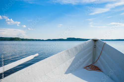 The bow of the boat on the lake.
