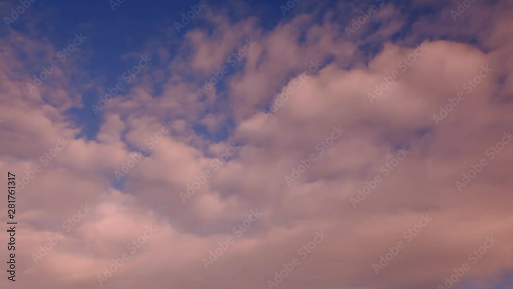 Tilt down of cloudy sky over Mont Saint Michel at sunrise, France Tilt down of cloudy sky over Mont Saint Michel at sunrise, France
