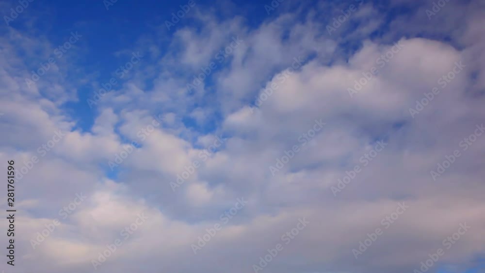 Tilt down of cloudy sky over Mont Saint Michel at sunrise, France Tilt down of cloudy sky over Mont Saint Michel at sunrise, France