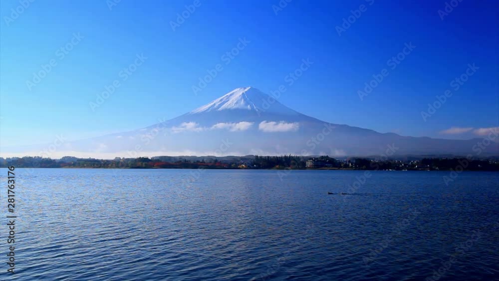 Lake Kawaguchi with Mount Fuji looming in background Lake Kawaguchi with Mount Fuji looming in background