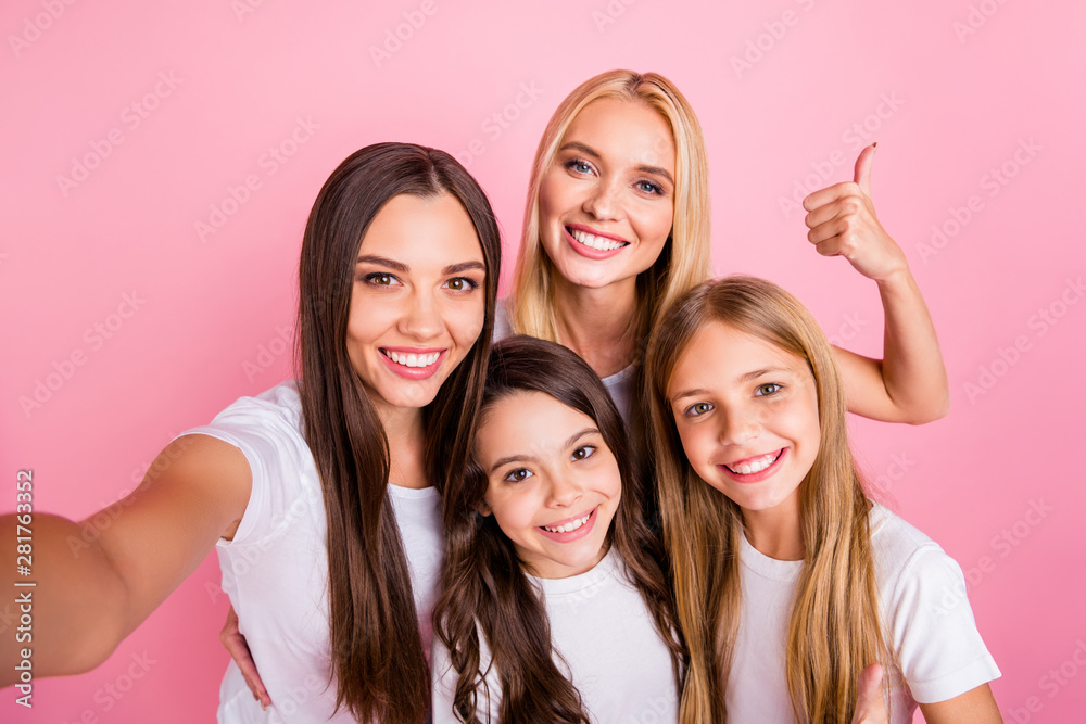 Self-portrait of four nice attractive lovely charming cute cheerful cheery long hair girls showing thumbup ad advert decision choose choice motherhood isolated over pink pastel background Self-portrait of four nice attractive lovely charming cute cheerful cheery long hair girls showing thumbup ad advert decision choose choice motherhood isolated over pink pastel background
