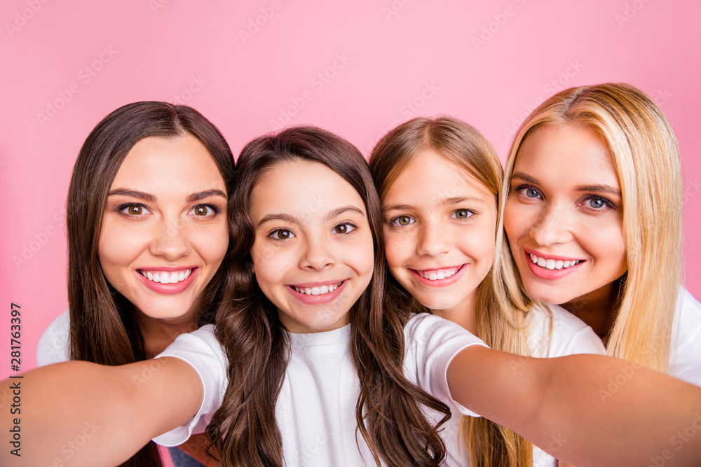 Self-portrait of four nice attractive winsome lovely charming cute sweet cheerful cheery long haired girls relatives best friends having fun spending holiday weekend isolated over pink background Self-portrait of four nice attractive winsome lovely charming cute sweet cheerful cheery long haired girls relatives best friends having fun spending holiday weekend isolated over pink background