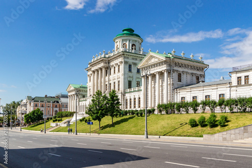 Pashkov House on Vozdvizhenka street in Moscow against blue sky with white clouds in sunny morning. Architecture of the historical center of Moscow