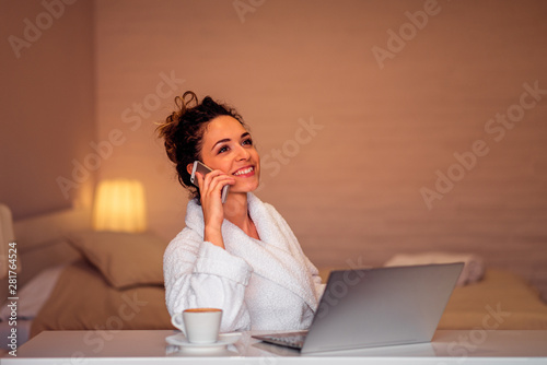 Successful millennial woman in bathrobe relaxing, portrait. Sitti photo