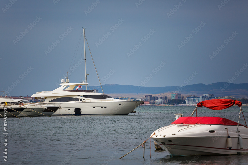 Fototapeta premium Boats are parked in the harbor. Summer seascape. Travel and Vacation Concept.