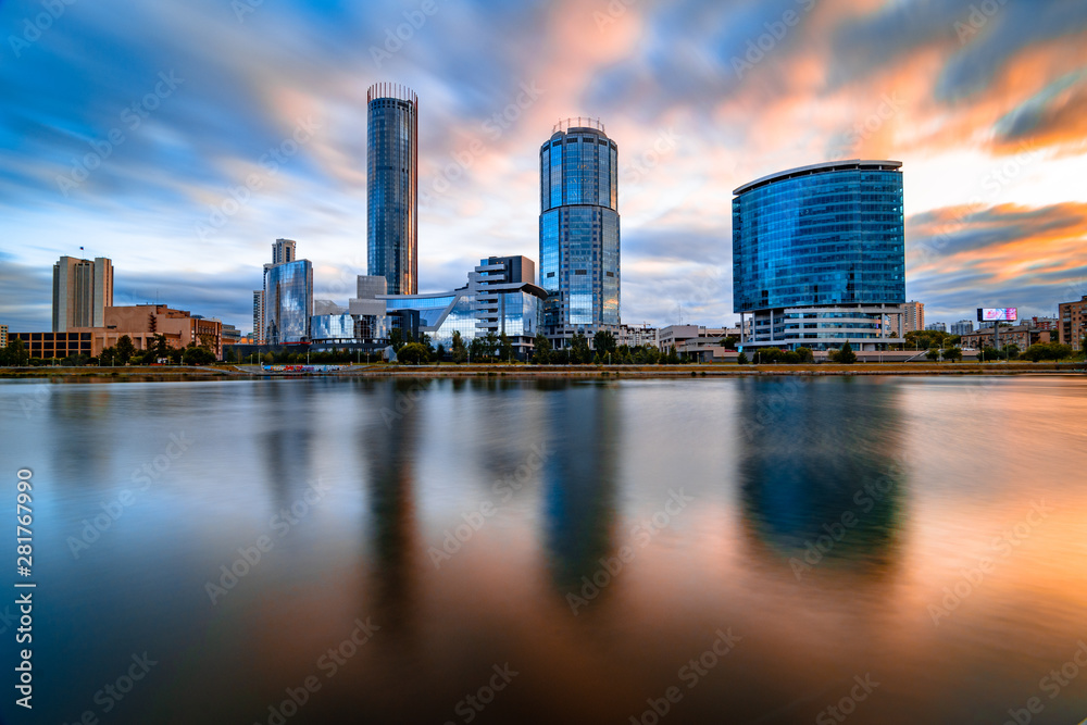 Beautiful cityscape Yekaterinburg at sunset with blurred blue and purple clouds