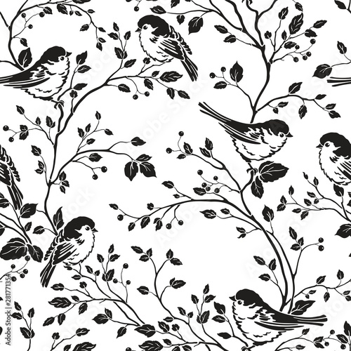 Photography Seamless floral pattern with silhouettes birds and branches with leaves