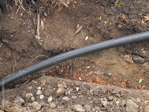 New plastic water pipe on the ground, Water Supply working on site.