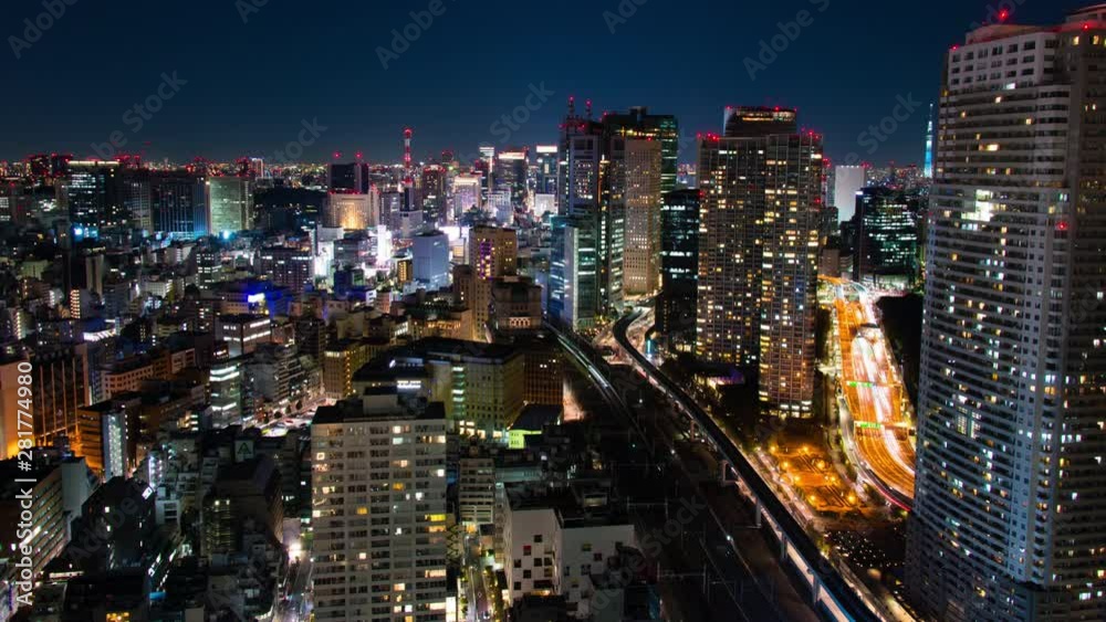 Minato ward cityscape with skyscrapers at night, Tokyo, Japan Minato ward cityscape with skyscrapers at night, Tokyo, Japan