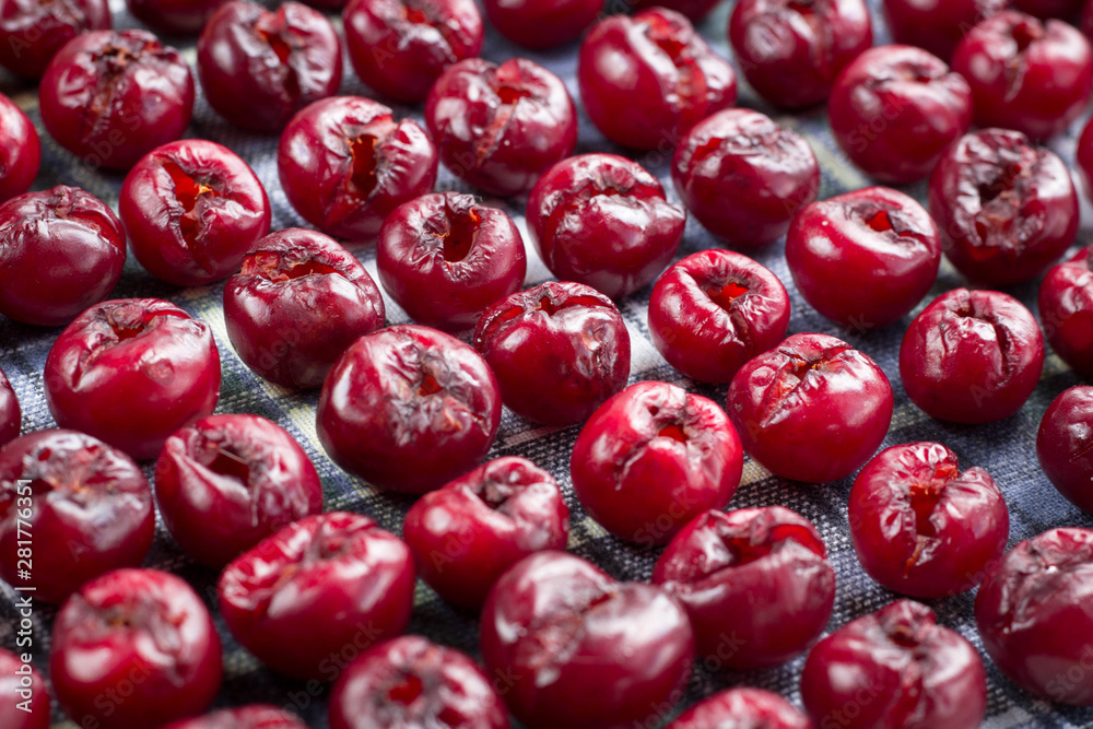 Pattern of mellow cherries prepared for sun drying for conservation Pattern of mellow cherries prepared for sun drying for conservation