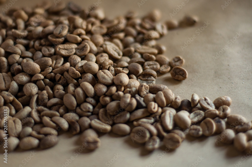 Unroasted Coffee Beans On Kraft Paper Background Unroasted Coffee Beans On Kraft Paper Background