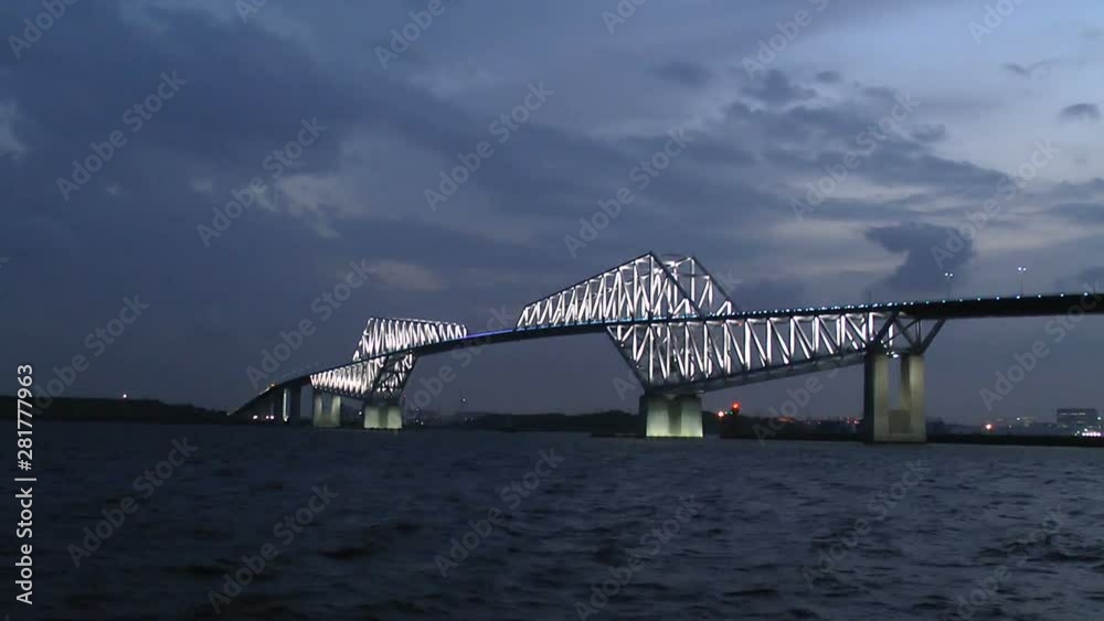 Crash zoom of illuminated Tokyo Gate Bridge at night, Japan Crash zoom of illuminated Tokyo Gate Bridge at night, Japan