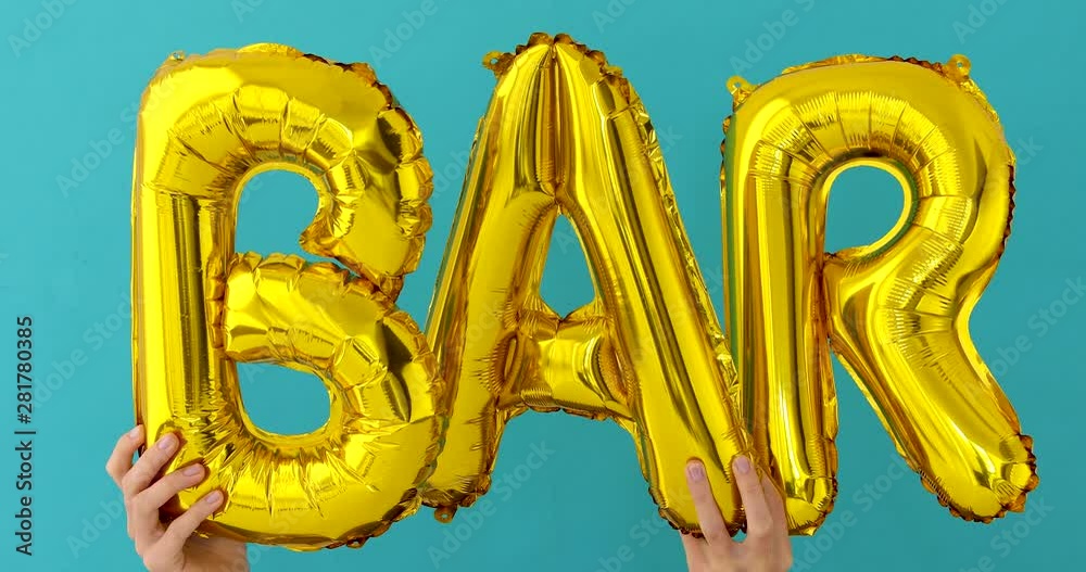 Golden BAR word made of inflatable balloons on blue background