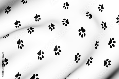 Animal paw prints on fabric. Abstract background with traces of the beast. 