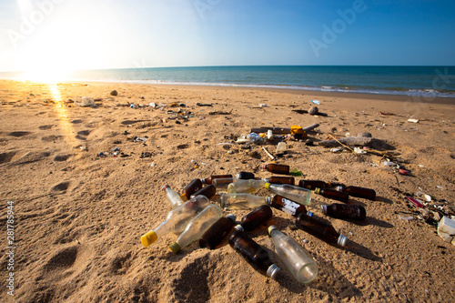 bottles and garbage waste on the beach