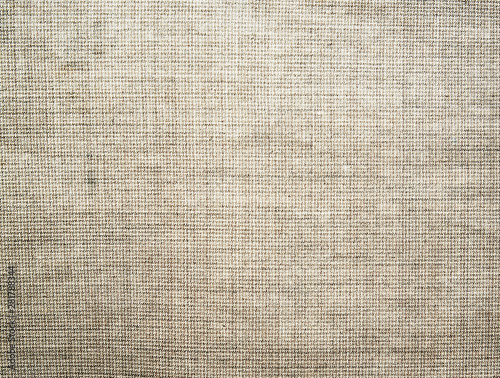 Textured background of gray crumpled canvas 