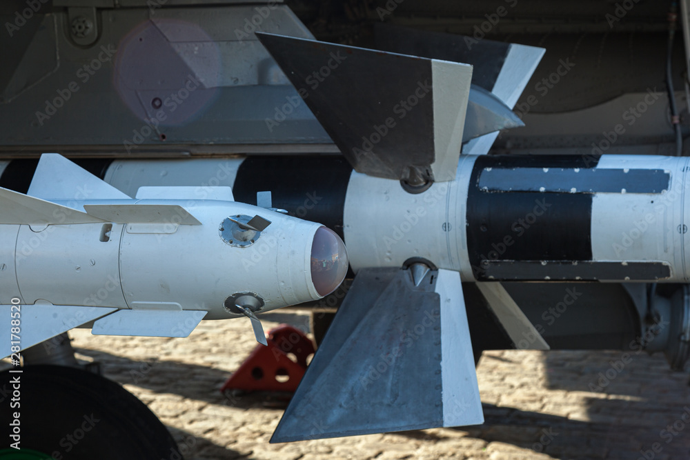 Bomb and missile on a fighter bomber plane. Armament of the aircraft. Aircraft missile launcher. Fighter bomber aircraft. Bomb and missile on a fighter bomber plane. Armament of the aircraft. Aircraft missile launcher. Fighter bomber aircraft.