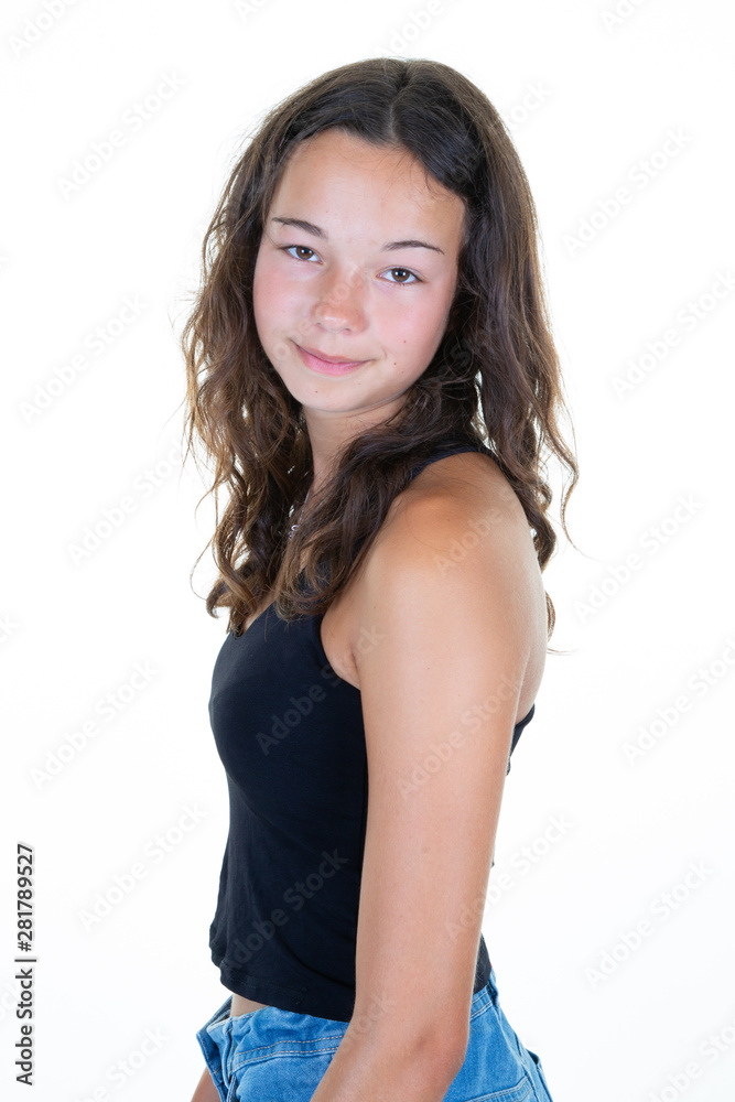 Portrait of young beautiful caucasian teenage girl in black t-shirt cheerfull smiling looking at camera in studio photo isolated white background Portrait of young beautiful caucasian teenage girl in black t-shirt cheerfull smiling looking at camera in studio photo isolated white background