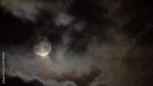 Wallpaper Mural Timelapse of clouds and moon in sky at night Torontodigital.ca