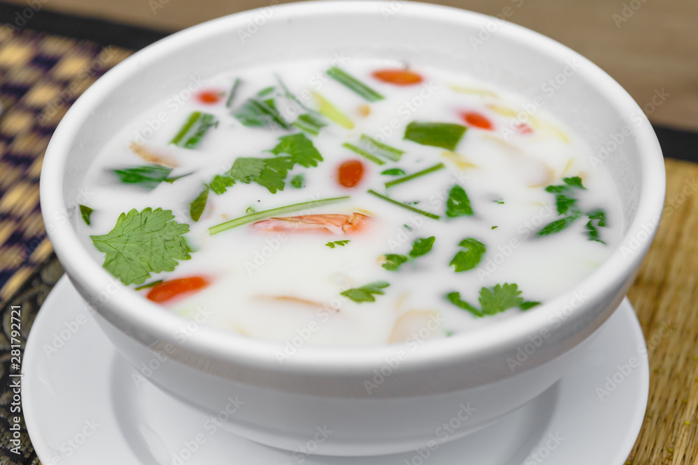 Tom kha kung, a traditional Thai coconut milk soup with shrimp and mushrooms Tom kha kung, a traditional Thai coconut milk soup with shrimp and mushrooms