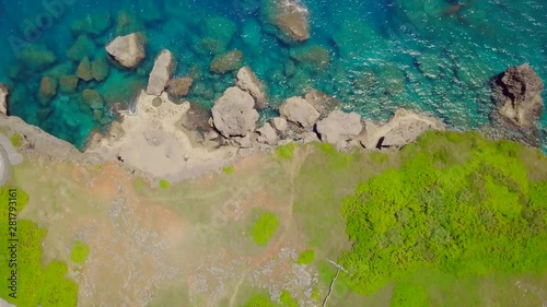 Aerial view of road and cliffs on seashore, Yomitan, Okinawa, Japan photo