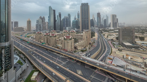 Dubai downtown skyline night to day aerial timelapse with traffic on highway © neiezhmakov