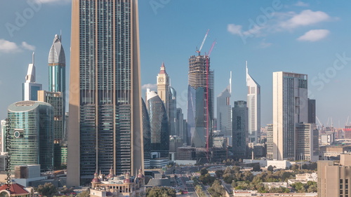 Photography Aerial view on downtown and financial district in Dubai timelapse, United Arab Emirates with skyscrapers and highways