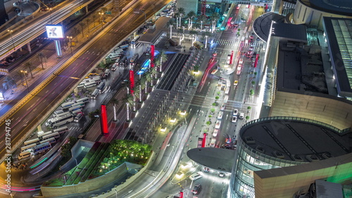 Aerial view of shopping mall with Financial center road night timelapse