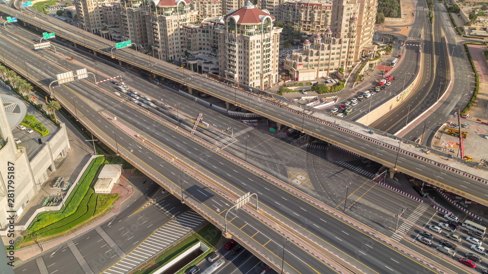 Aerial view of highway interchange in Dubai downtown morning timelapse.