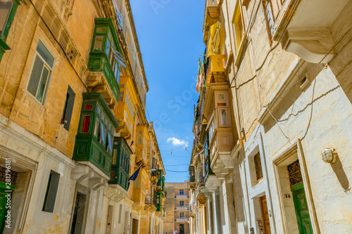 Maltese streets and colorful wooden balconies in Valletta, Malta