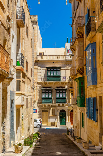 Maltese streets and colorful wooden balconies in Valletta  Malta
