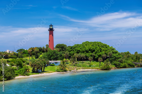 Beautiful view of the Jupiter lighthouse at sunny summer day in West Palm Beach County, Florida photo