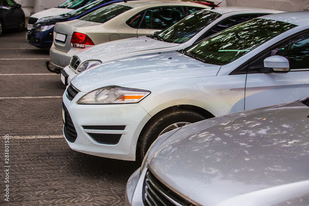 cars in the parking lot cars in the parking lot