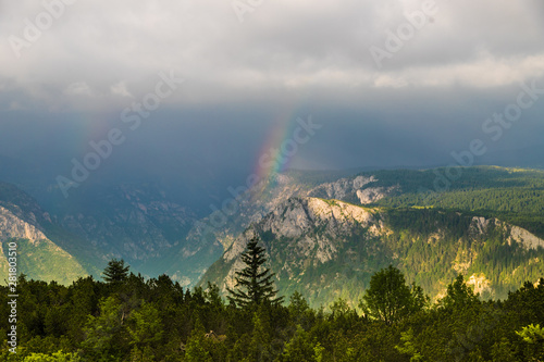 rainbow in the mountains panoramic view of Montenegro mountains in Durmitor park