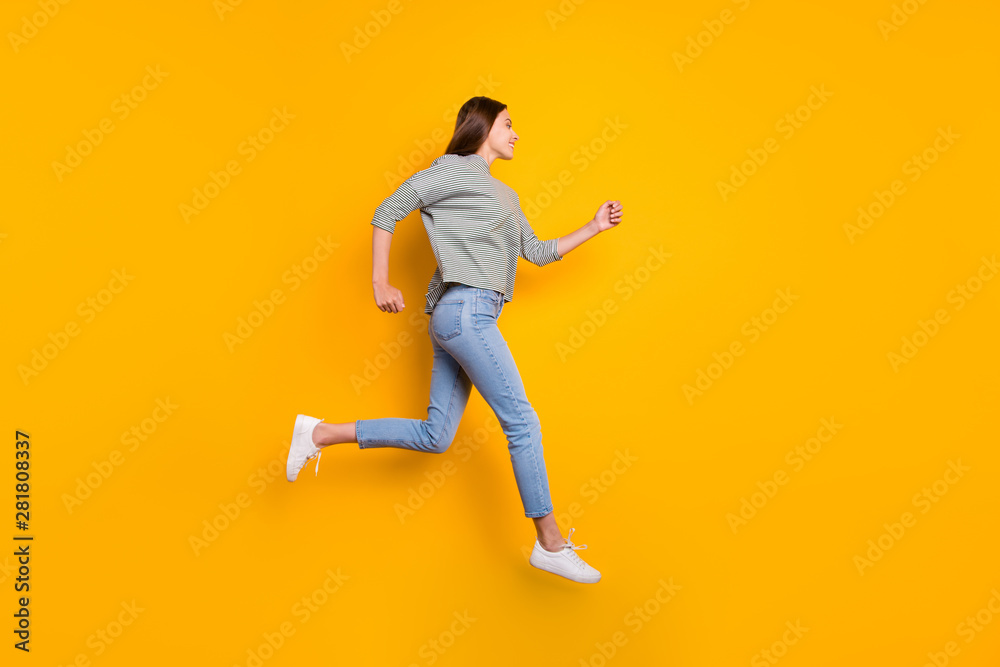 Full length body size photo of girl having noticed someone she likes on another side of road and running up to him while isolated with yellow background Full length body size photo of girl having noticed someone she likes on another side of road and running up to him while isolated with yellow background
