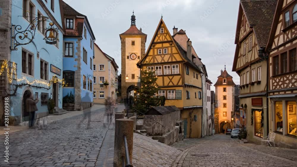 Day to night timelapse of Rothenburg ob der Tauber old town Das Plonlein at Christmas, Bavaria, Germany. Day to night timelapse of Rothenburg ob der Tauber old town Das Plonlein at Christmas, Bavaria, Germany.