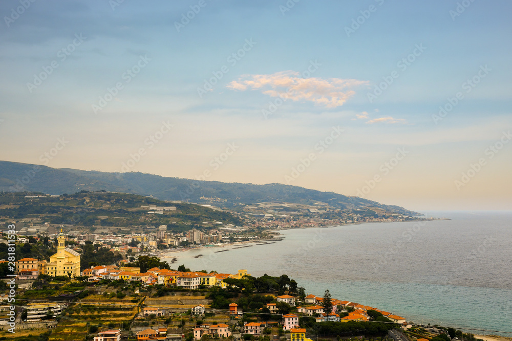 High angle view of the Ponente Riviera with the sea village of Bussana Nuova on Marine Cape and the coastal cities of Arma di Taggia and Santo Stefano Mare in the background, Imperia, Liguria, Italy