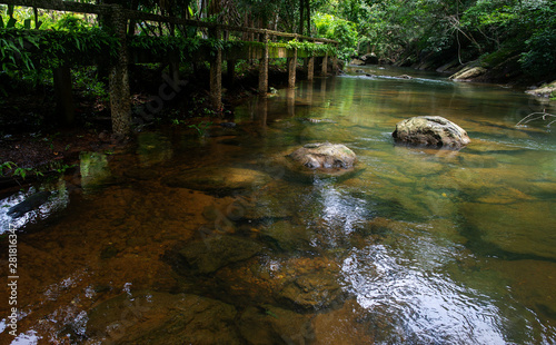 Natural waterfall  shoulder river  through the top of the mountain