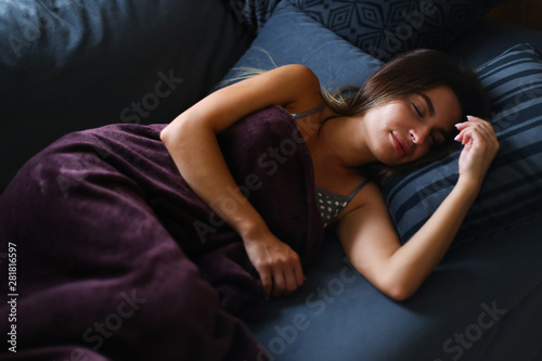 Soft focused girl sleeping at home at the sofa 