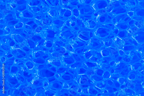 deep blue colored polymeric material with a sponge structure