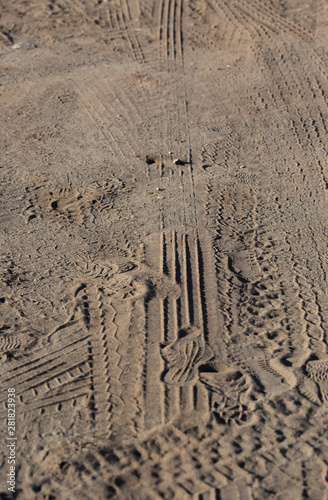 tire marks in the sand