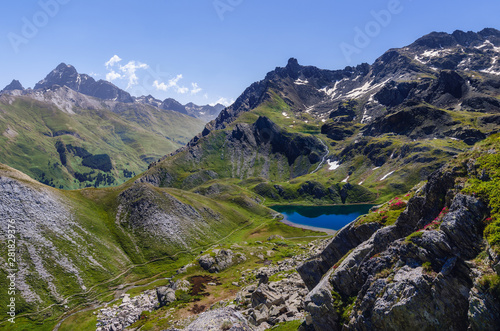 The Lac Bleu in Chianale, mountain lake in the italian alps of Cuneo, Piedmont, facing the famous Monviso peak, or mount viso