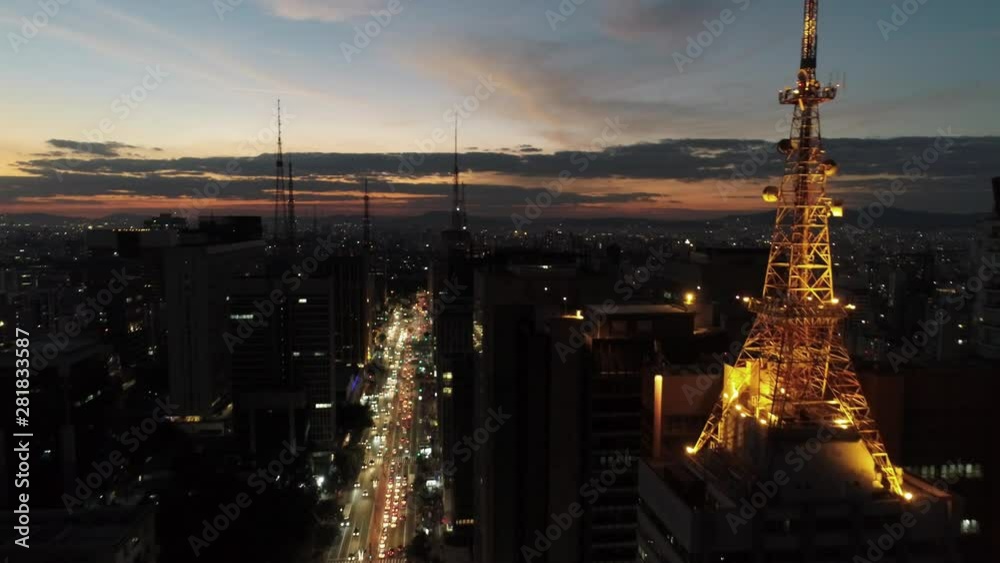 Sunset view in the illuminated Paulista avenue, Sao Paulo, Brazil.Sunset view in the illuminated Paulista avenue, Sao Paulo, Brazil.Sunset view in the illuminated Paulista avenue, Sao Paulo, Brazil.