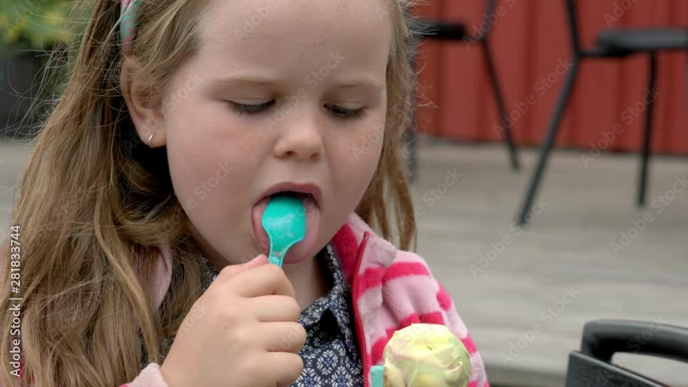 Happy girl eating ice cream Happy girl eating ice cream