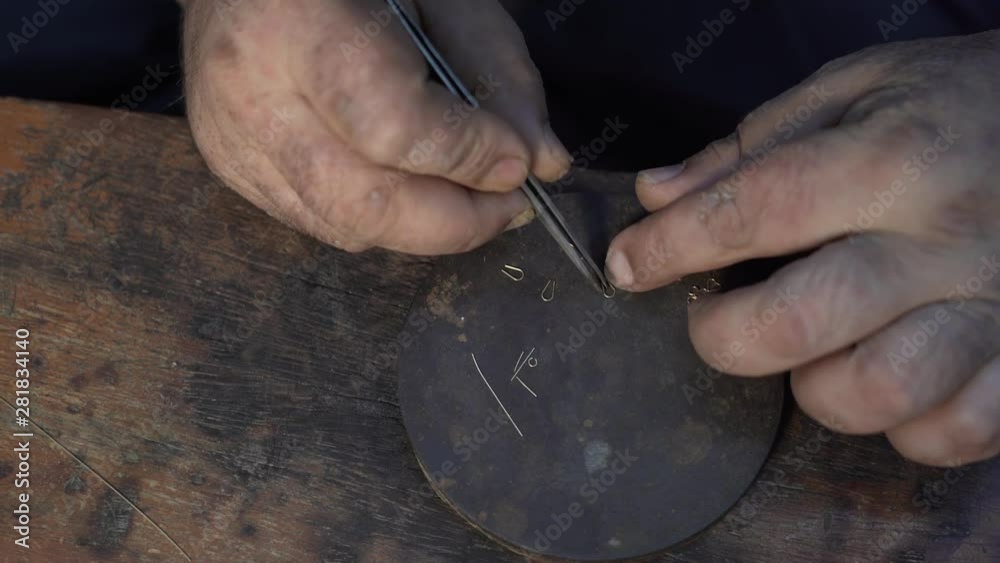 Jeweler Works on a tiny little gold shamrock gold piece 4K