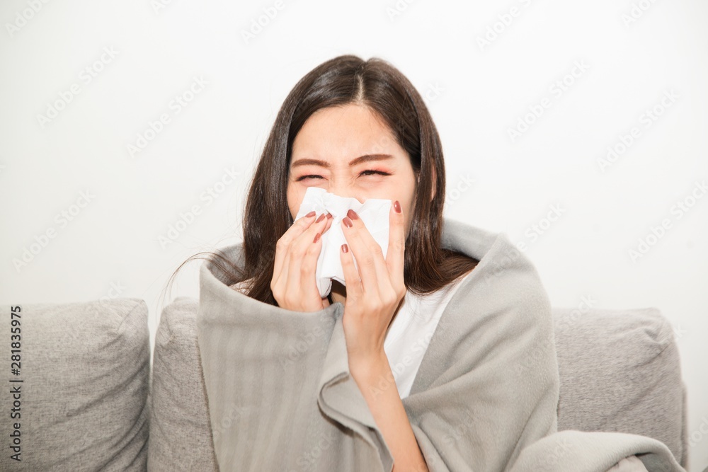 Asian women with stress that suffer from allergies and close the nose with tissue paper. Because of having sneezing all the time .. Asian women with stress that suffer from allergies and close the nose with tissue paper. Because of having sneezing all the time ..