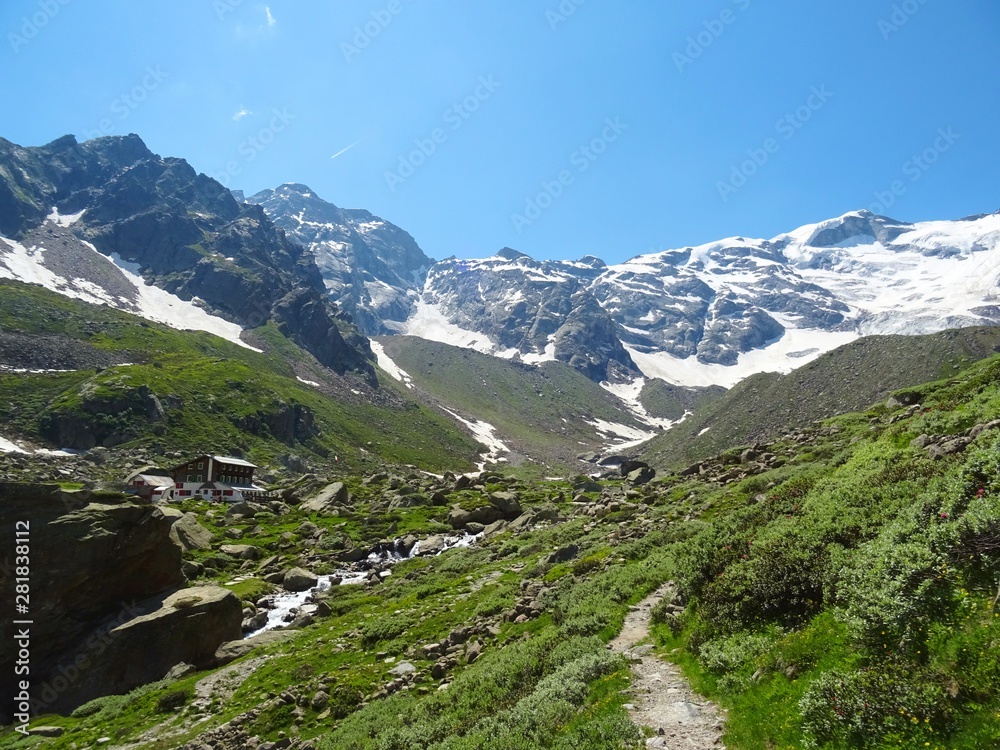 The Alps with its woods and glaciers near Monte Rosa and the town of Macugnaga, Italy - July 2019.