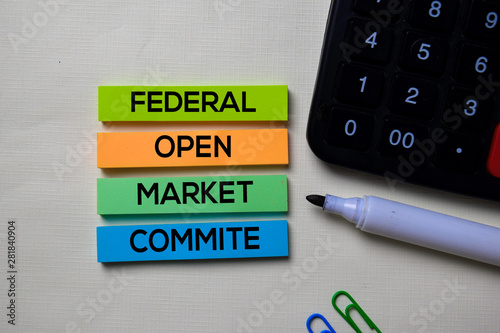 Federal Open Market Commite - FOMC text on sticky notes isolated on office desk photo